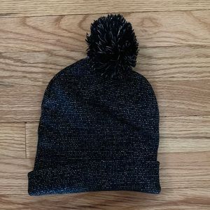 Black and metallic beanie with pom pom